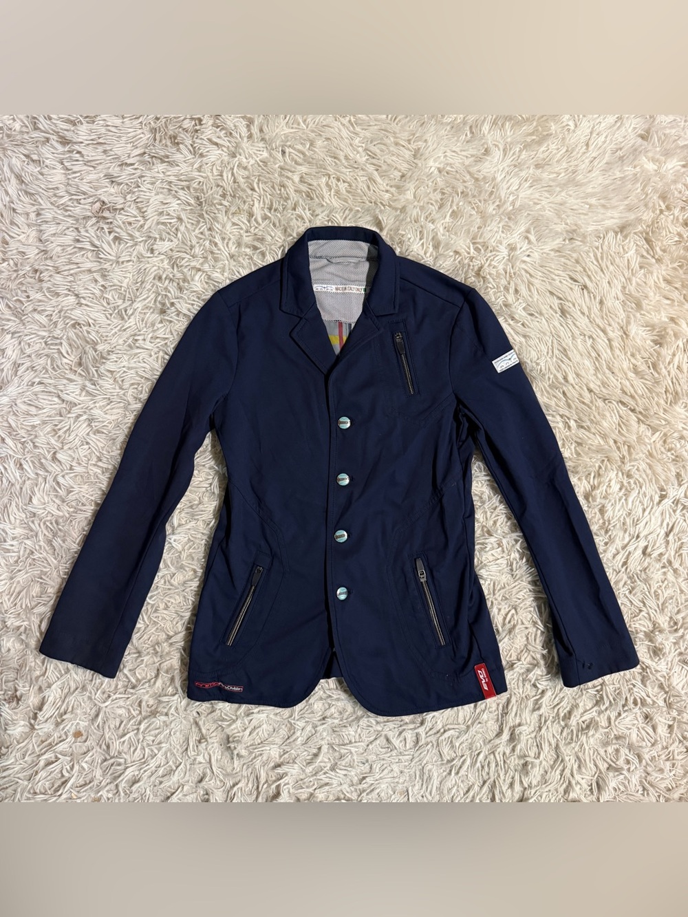 Child’s Size 10R Navy Animo Horseback Riding Show Coat. Loose stitching.